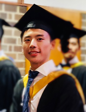 Jie Zhu in his graduation gown