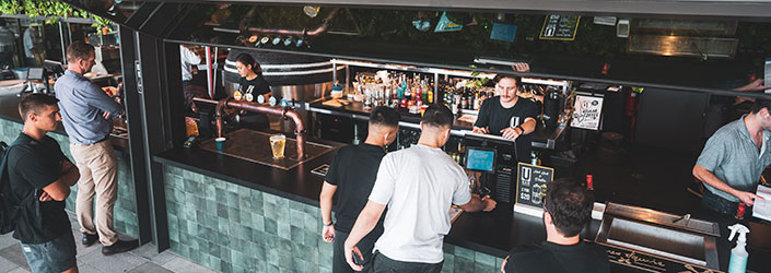 Ubar cashiers and customers at Ubar