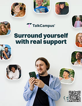 Image of a guy looking at his phone