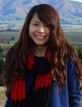Portrait of Dieu-Linh Nguyen with mountains in background