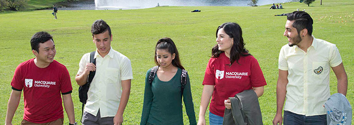 medium shot of mentors and high school students walking together